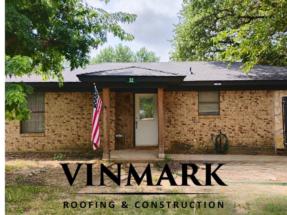Elegant Black Shingle Roof on Gorgeous Brick Home